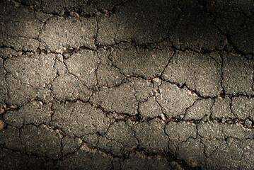 Cracked asphalt texture. Top view. Asphalt. Road background
