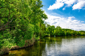 Carpfishing session at the Lake.Carp Angling scenic landscape overlooking lake at and blue sky with...