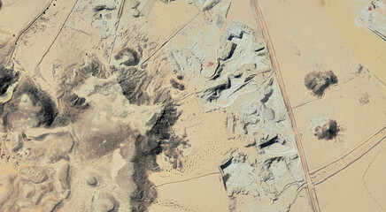 The landscape of the sandy desert in Qatar from a bird's eye view