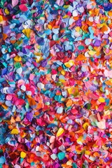 A colorful stack of paper flowers for decorative purposes, ideal for parties and celebrations