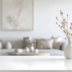 A minimalistic living room with a decorative vase and soft furnishings.
