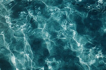 Fototapeta premium Craft a visually stunning close-up image of a crystal-clear blue ocean showcasing subtle ripples and reflections, portraying a sense of calm and serenity using CG 3D techniques.