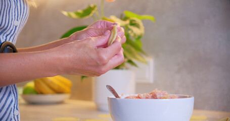 Woman Making Homemade Ravioli in Modern Kitchen