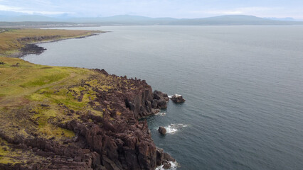 Aerial view The Yankito lava plateau on the Pacific coast of Kuril Islands,Iturup,Russia.