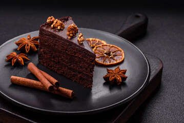 Piece of sweet chocolate cake with nuts