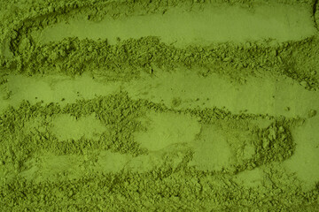 Matcha tea, matcha powder as a background.