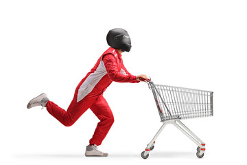 Car racer with a black helmet pushing a shopping cart