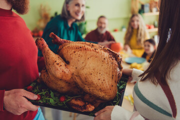 Photo of family serving table holiday stuffed baked tasty traditional meat turkey thanksgiving day indoors
