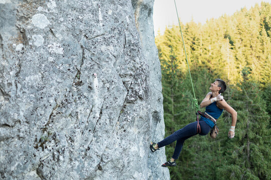 Woman Rock Climber Injuring a Shoulder while Climbing