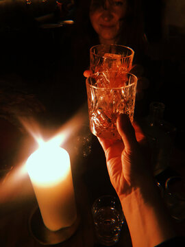 UGC shot of Cheers With Cocktails at Evening Social Gathering