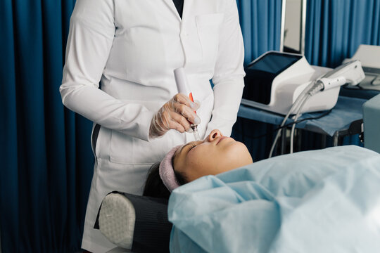 Woman being pampered at a dermatologist.
