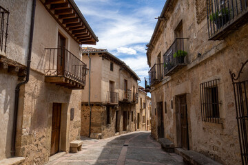 Typical street in the old town of Pedraza, Segovia, Castilla y Leon, Spain, with its medieval houses and alleys