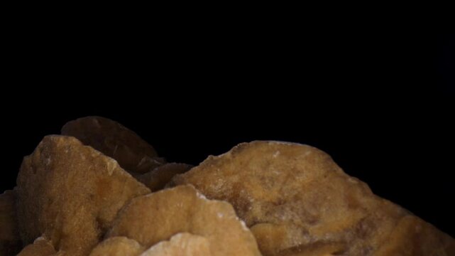 Dolly out, close-up, macro fly over the surface of the desert rose, rose-like formation of crystal clusters of gypsum.