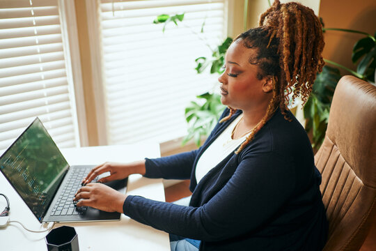 black woman working from home
