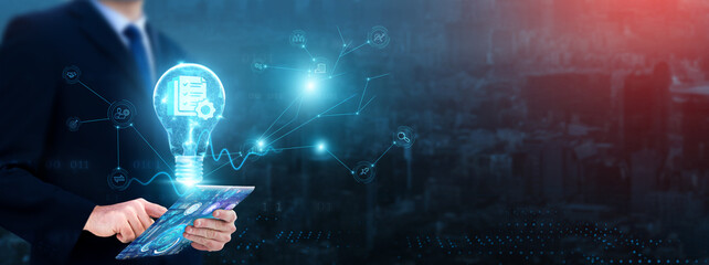 Project Management: Businessman using tablet with growth graph analyzing project management and...