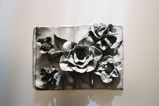Black Ceramic Piece Of Book With Flowers