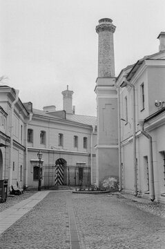 Historical Urban Courtyard with Chimneys in Black and White
