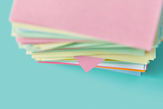 Tower of sticky notes with selective focus on down part