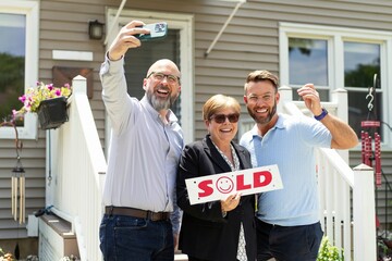 Gay Couple Celebrating Home Purchase