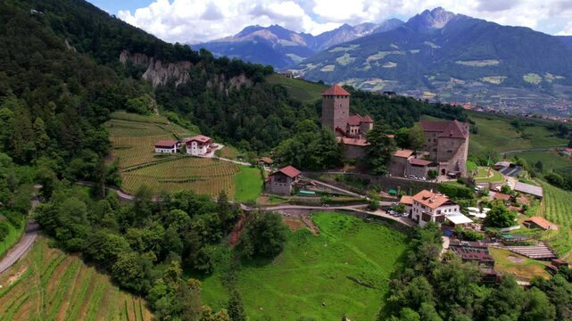 Tyrol Castle is the most historically significant castle in South Tyrol near Merano town. Alto Adige, Italy. Aerial drone 4k jd video