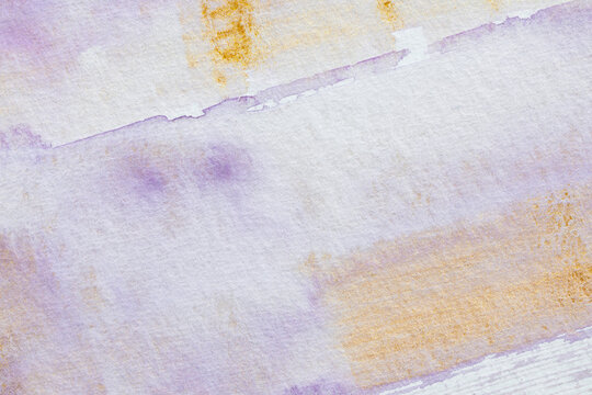 Abstract watercolor with soft gold textures 