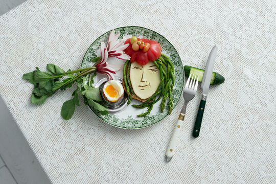 food styling on a plate in the form of a girl's face