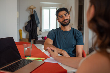 Couple planning over the laptop