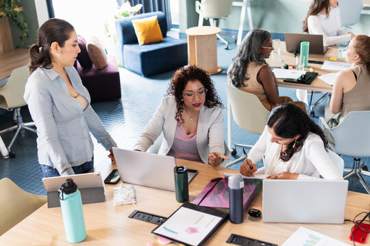 Top view of a group of people working in the office.
