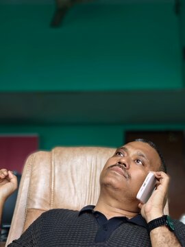 Facial expression of a middle aged Indian man