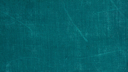 Close up view of textured teal fabric, pattern, vibrant color