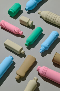 Colorful Reusable Water Bottles Arranged in Flat Lay Design