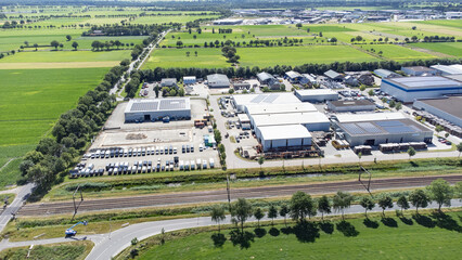  Industrial area with company buildings from above drone view.