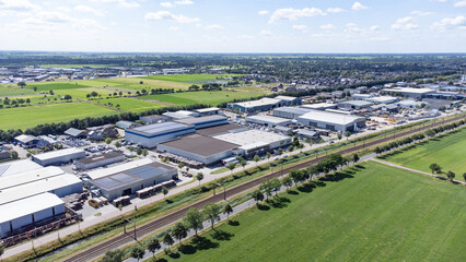  Industrial area with company buildings from above drone view.