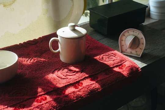 Tasting at a Tea Factory - Morning Light on Kitchen Counter With a Cup