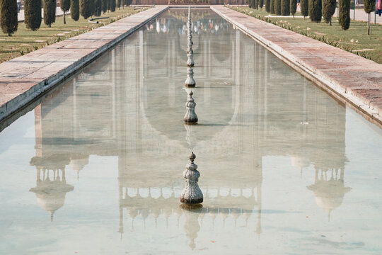Reflection of the Royal Gate of the Taj Mahal