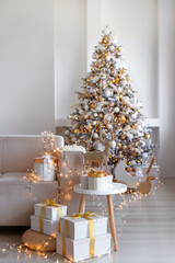 An Elegant Christmas Tree beautifully positioned in a Modern Living Room, adorned with Gifts