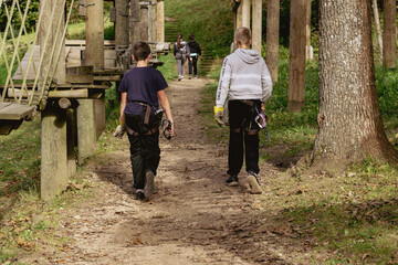People go to Zip line in forest. 07.10.2024. Sigulda. Latvia.