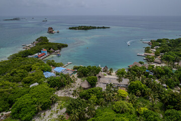 Aerial view of  the beautiful Bora Bora island and Island de Rosario turquoise waters, Resorts and yachts in Cartagena.