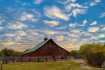 Red barn with horse in corral near Burns Oregon
