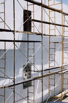 Building Under Construction with Scaffolding