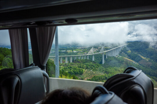 View on a Bridge Through the Bus Window