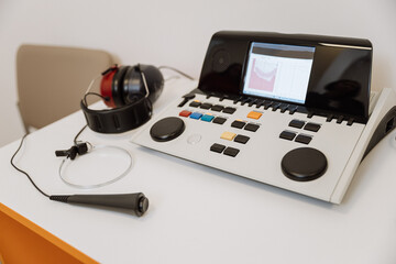 Fototapeta premium Operator working on medical diagnostic equipment, ideal for healthcare, technology, and medical use