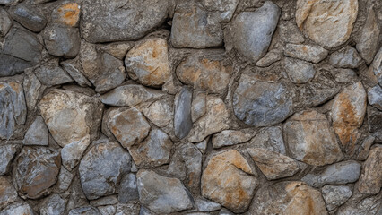 A rough, textured stone wall provides a rustic backdrop.