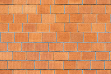 Seamless pattern of a brown brick wall