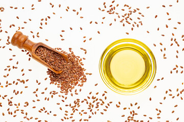 Healthy flaxseeds - Linum usitatissimum oil in glass bowl.