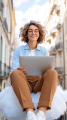 A young woman, comfortably sitting on a fluffy cloud, uses her laptop in a vibrant urban setting, symbolizing the modern digital lifestyle and freedom.
