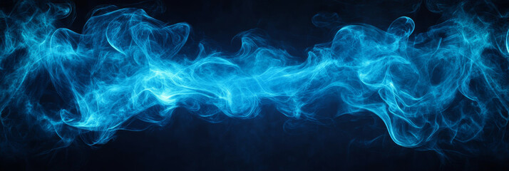 Obraz premium Abstract blue smoke swirls on a dark background.