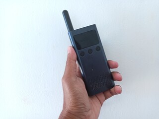 hand holding HT isolated on white background 