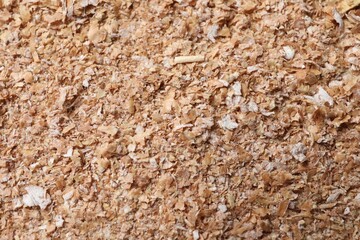 Heap of wheat bran as background, top view