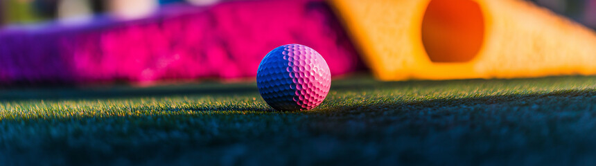 A Day Out at the Mini Golf Course: Where Laughter and Friendly Competition Come Together for a Memorable Experience with Loved Ones